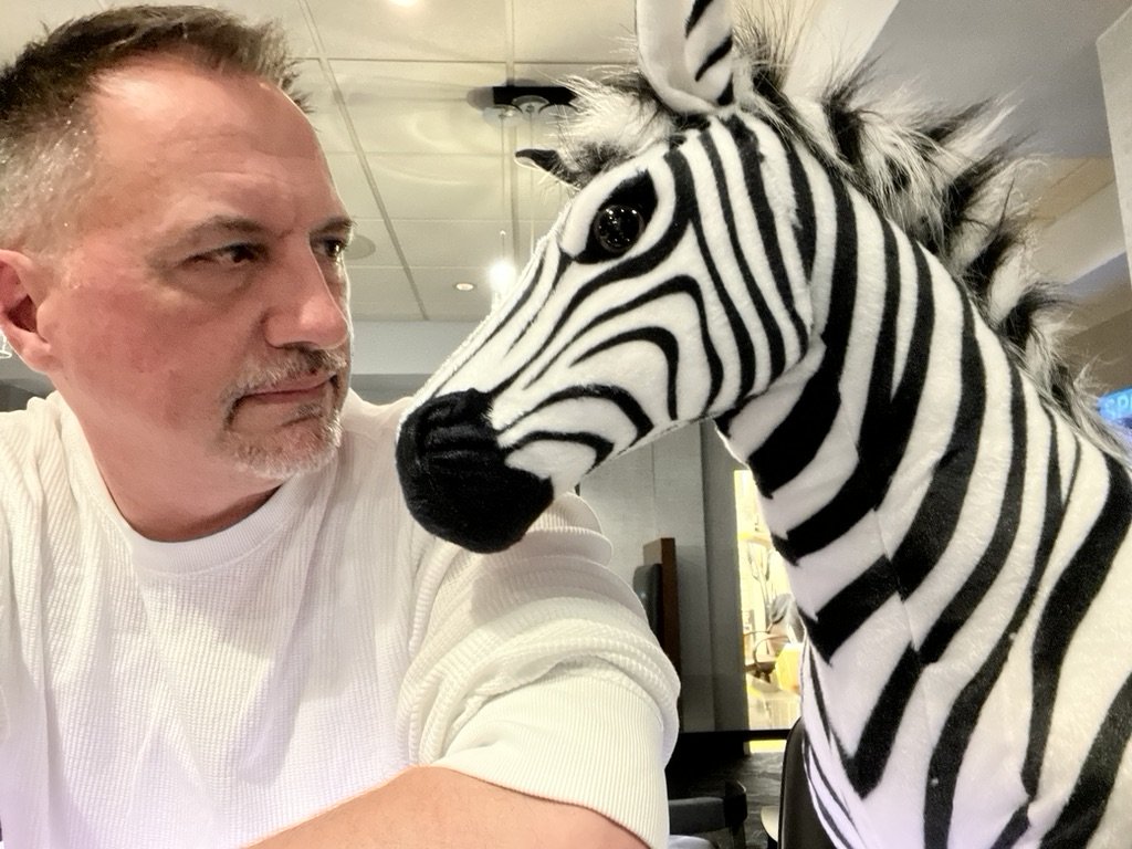 John and Frank, eye to eye at the Renaissance bar in Carmel, Indiana — April 13, 2022